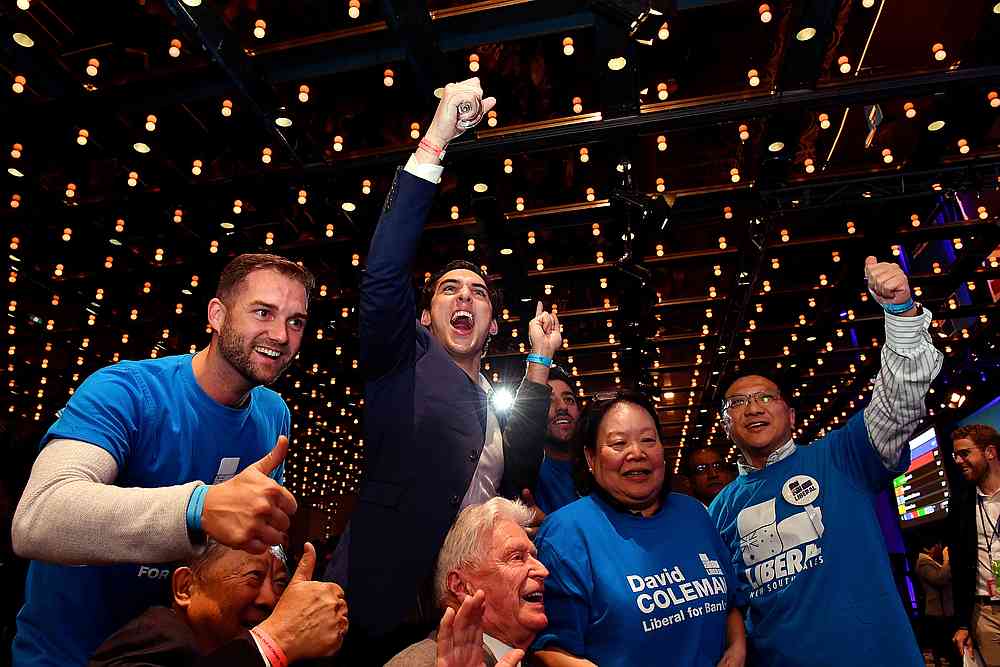Australia's Liberal Party supporters react during the results count at the Federal Liberal Reception at the Sofitel-Wentworth hotel in Sydney May 18, 2019. u00e2u20acu201d AAP image/Mick Tsikas via Reuters