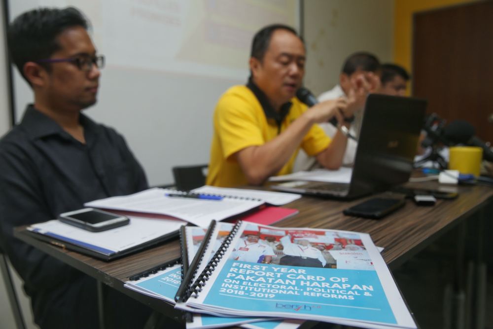 Copies of the report cards prepared by electoral reform watchdog Bersih 2.0. ― Picture by Choo Choy May