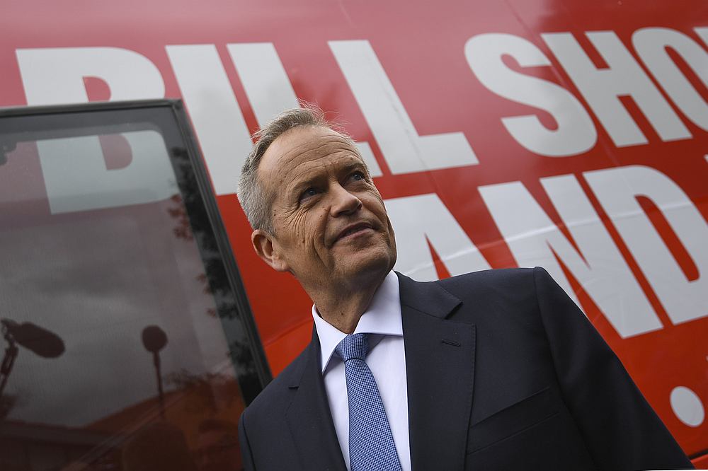 Australian opposition leader Bill Shorten is seen next to the campaign bus at the Ryde Medical Centre in Sydney April 12, 2019. u00e2u20acu201d AAP Image/Lukas Coch via Reuters