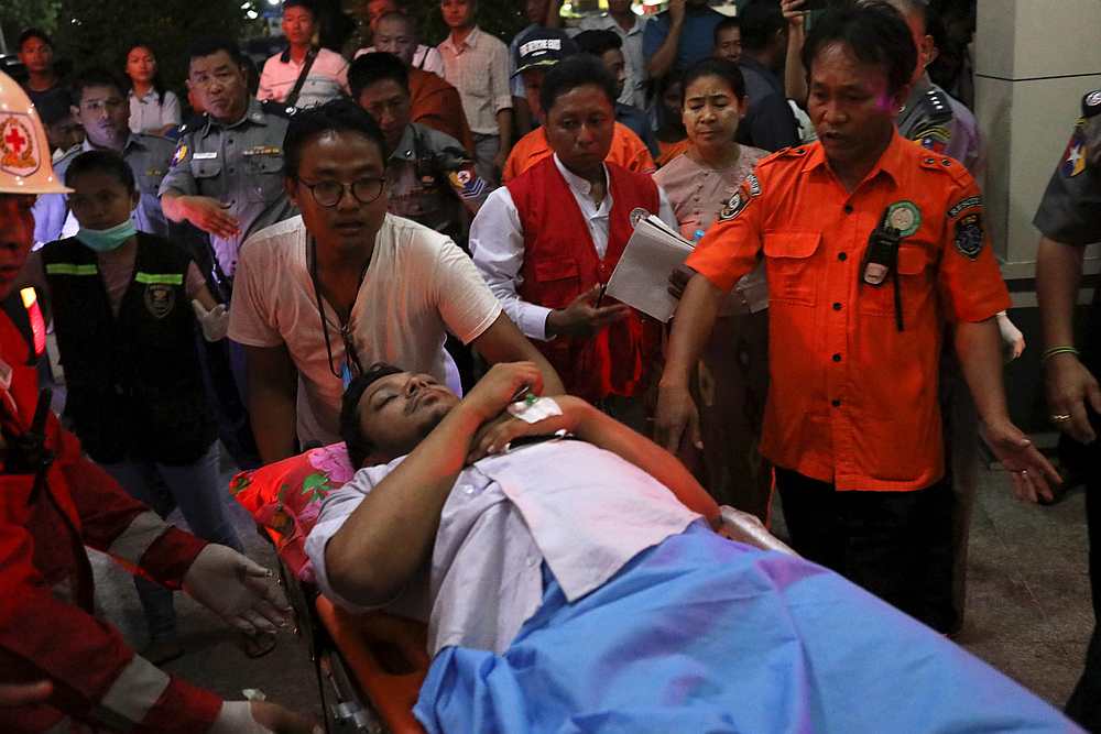 An injured passenger from a Biman Bangladesh Airlines plane that came off the runway as it landed in bad weather at Yangon's international airport, Myanmar May 8, 2019. u00e2u20acu201d Reuters pic