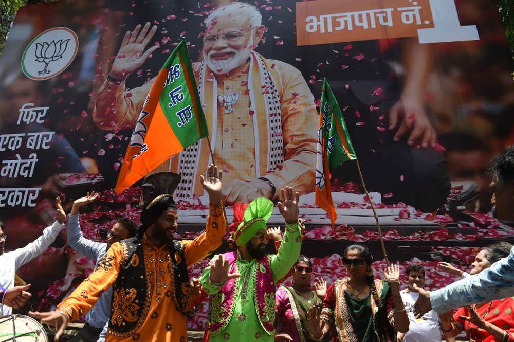 Supporters of Indian Prime Minister Narendra Modi and his ruling Bharatiya Janata Party (BJP) celebrate the election results outside the BJP headquarters in Mumbai on May 23, 2019. u00e2u20acu201d AFP pic