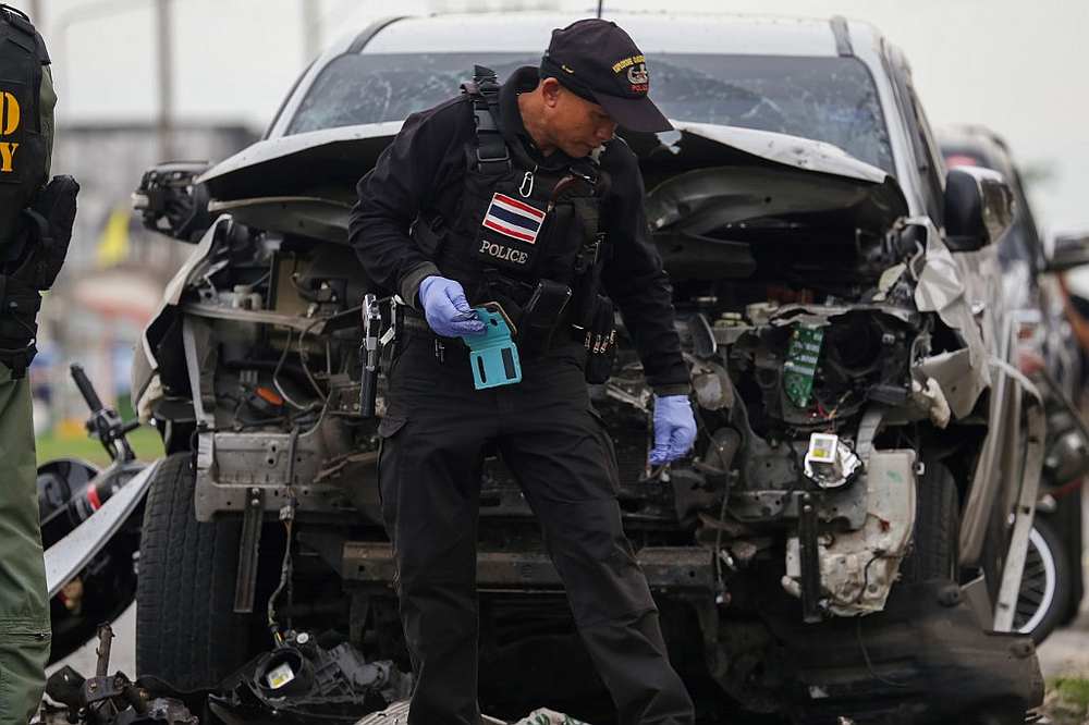 A policeman inspects a site of a motorcycle bomb blast in a flea market in the southern Thai province of Pattani on May 27, 2019. u00e2u20acu201d AFP pic