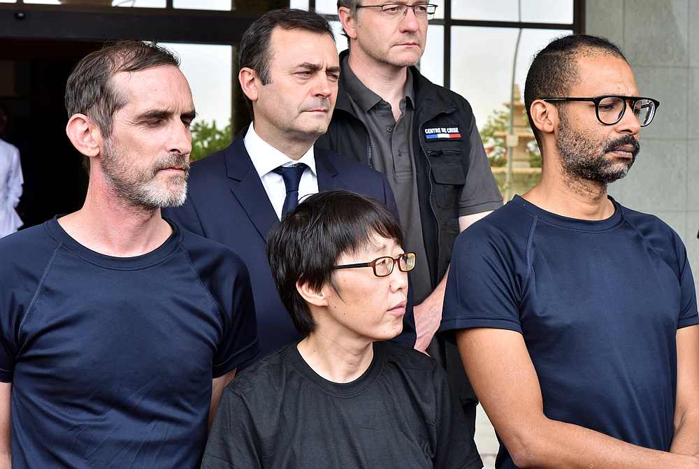 Rescued hostages, two French citizens and one South Korean, attend a news conference at the presidency in Ouagadougou, Burkina Faso May 11, 2019. u00e2u20acu201d Reuters pic