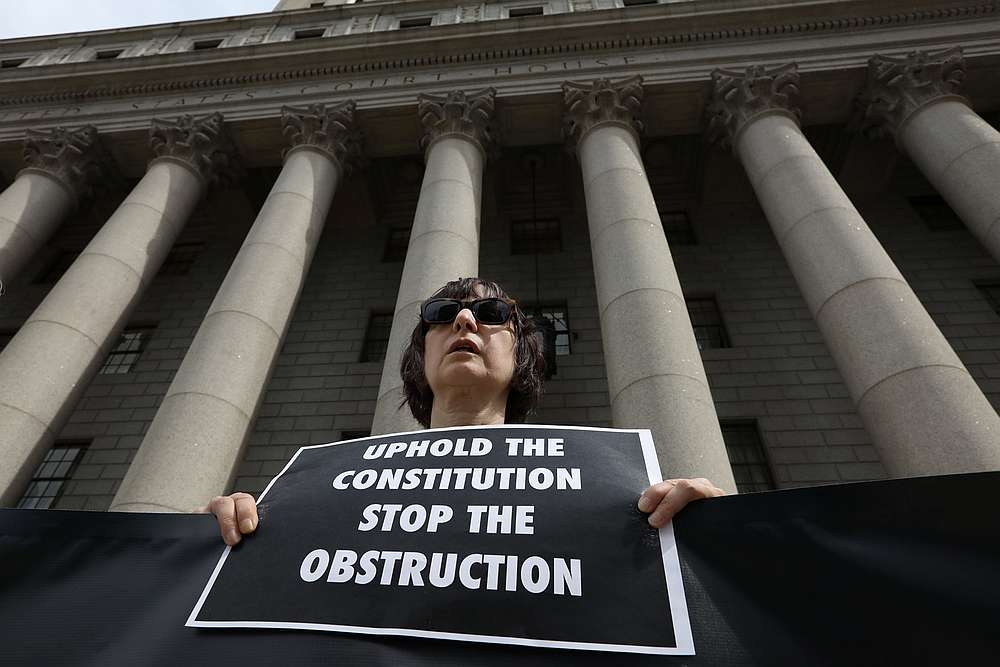 A protester stands outside the Manhattan Federal Courthouse, while lawyers for US President Donald Trump, his family and the Trump Organization want to resist having to provide financial records, in New York City May 22, 2019. u00e2u20acu201d Reuters pic
