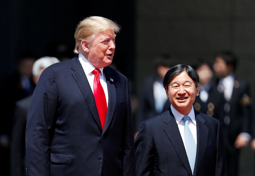 US President Donald Trump is escorted by Japan's Emperor Naruhito during a welcome ceremony at the Imperial Palace in Tokyo May 27, 2019. u00e2u20acu201d Reuters pic