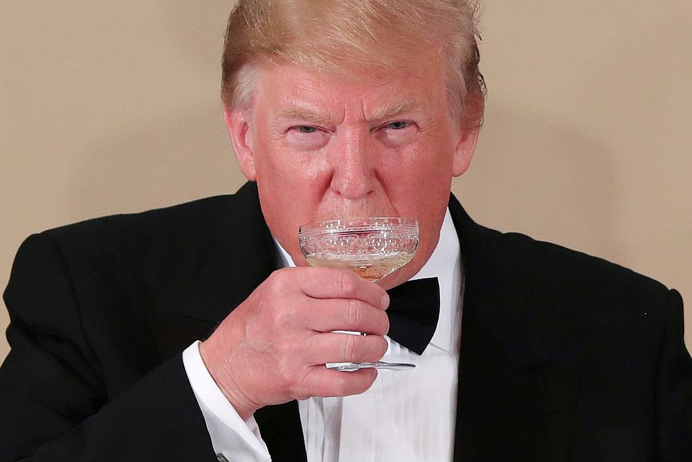 US President Donald Trump drinks during a state banquet at the Imperial Palace in Tokyo May 27, 2019. u00e2u20acu201d Reuters pic