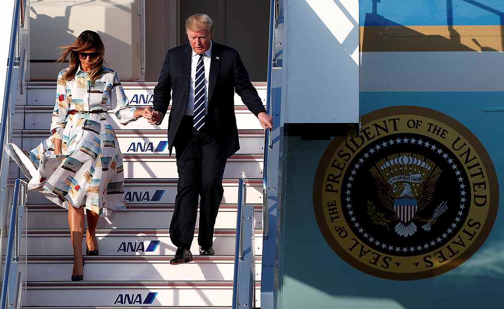 US President Donald Trump and first lady Melania Trump arrive aboard Air Force One at Tokyo Haneda Airport, Japan May 25, 2019. u00e2u20acu201d Reuters pic