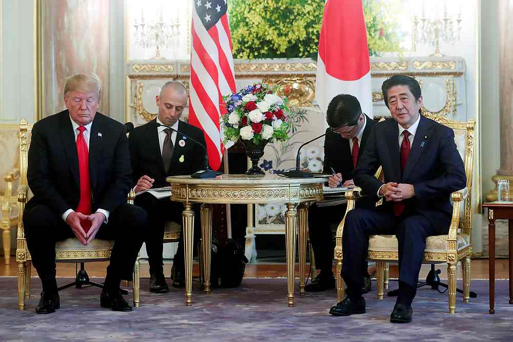 US President Donald Trump talks with Japan's Prime Minister Shinzo Abe during their meeting at Akasaka Palace state guest house in Tokyo May 27, 2019. u00e2u20acu201d Reuters pic