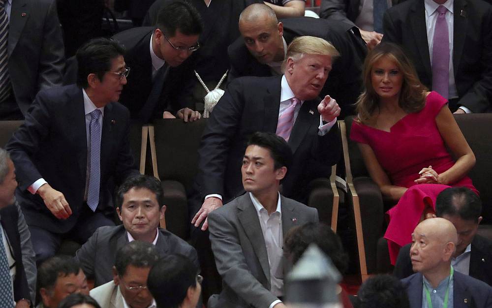 US President Donald Trump, first lady Melania Trump and Japanese Prime Minister Shinzo Abe watch the Summer Grand Sumo Tournament in Tokyo, Japan May 26, 2019. u00e2u20acu201d Reuters pic
