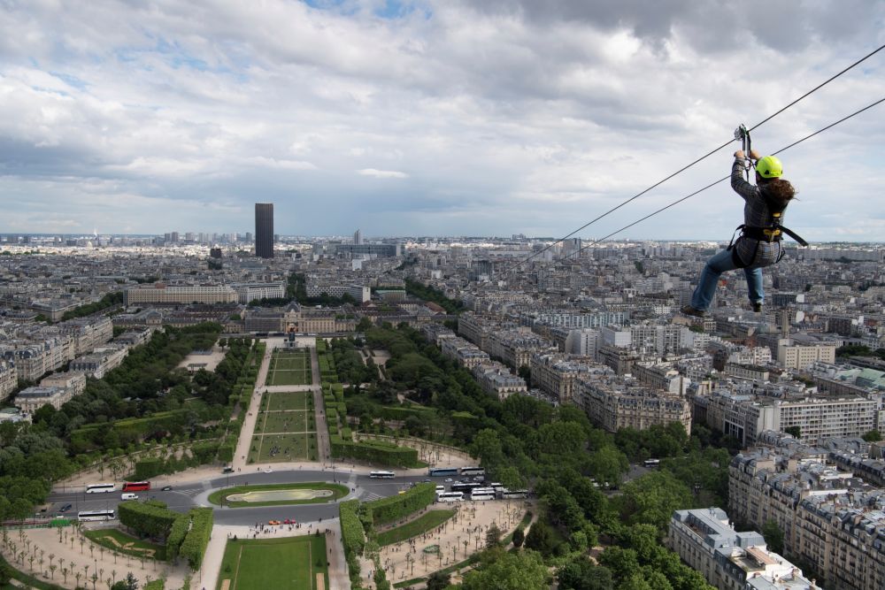 A person rides on a zip line descending from the second floor of the Eiffel Tower on May 28, 2019 in Paris. u00e2u20acu201d AFP pic