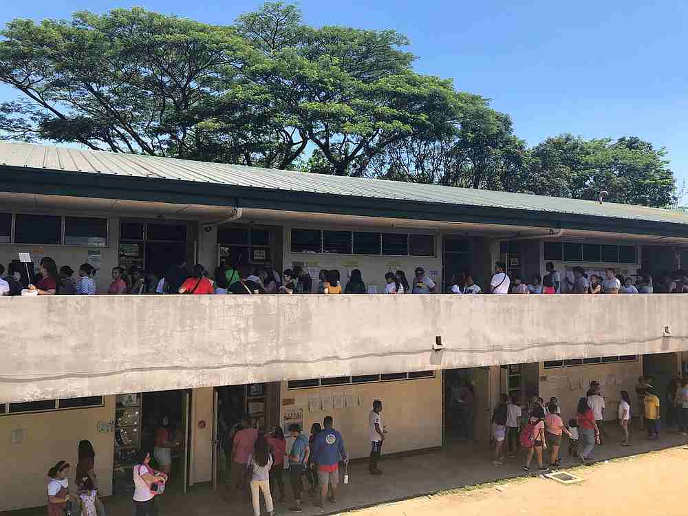 Voters walk to a polling precinct to vote in the midterm elections in Manila, Philippines May 13, 2019. u00e2u20acu201d Reuters pic