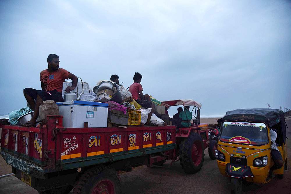 Villagers sit on a vehicle as they leave for a safer place ahead of cylcone Fani on the outskirts of Konark in the eastern state of Odisha, India, May 2, 2019. u00e2u20acu201d Reuters pic