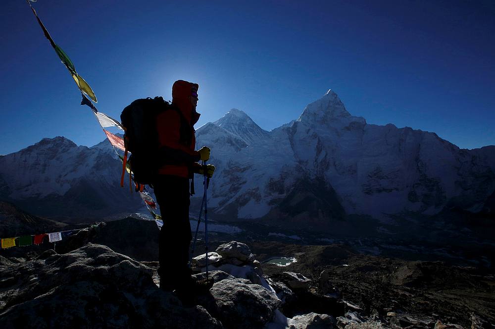 A trekker stands in front of Mount Everest, which is 8,850 metres high, at Kala Patthar in Solukhumbu District May 7, 2014. u00e2u20acu201d Reuters pic