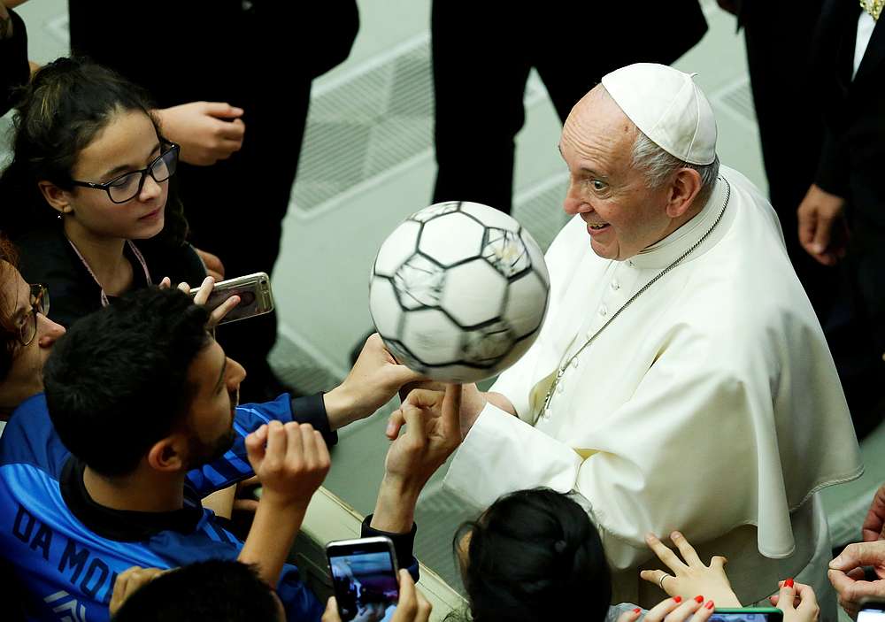 Pope Francis gestures as he participates alongside thousands of football-mad children in a project to promote the values of sport and football, at the Vatican May 24, 2019. u00e2u20acu201d Reuters pic 