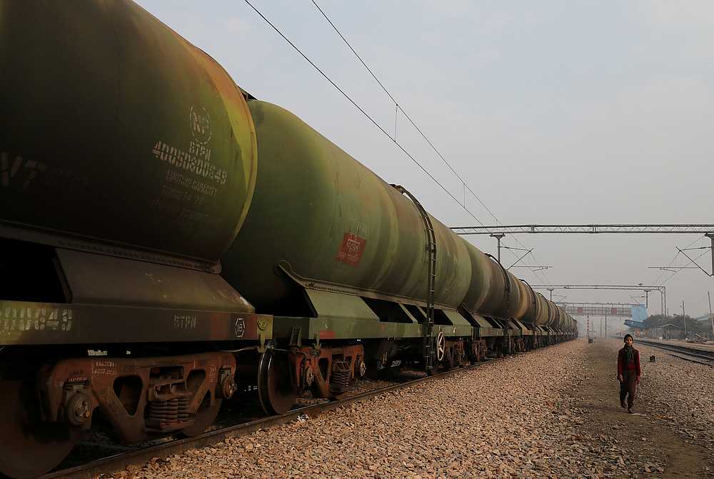 A boy walks past an oil tanker train stationed at a railway station in Ghaziabad, on the outskirts of New Delhi, India February 1, 2019.  u00e2u20acu201d Reuters pic