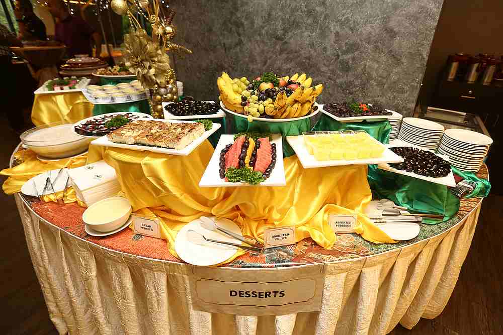 The spread features a variety of local and international desserts to tantalise all tastebuds. — Picture by Mohd Yusof Mat Isa