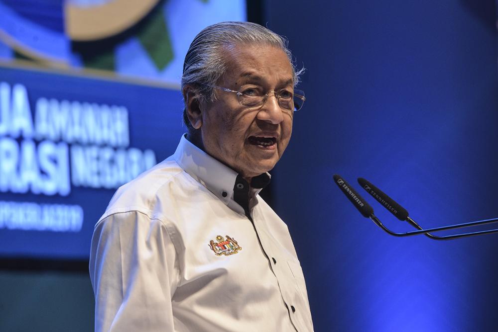Prime Minister Tun Dr Mahathir Mohamad speaks during the National Labour Day Celebration in Putrajaya May 1, 2019. u00e2u20acu2022 Picture by Shafwan Zaidon