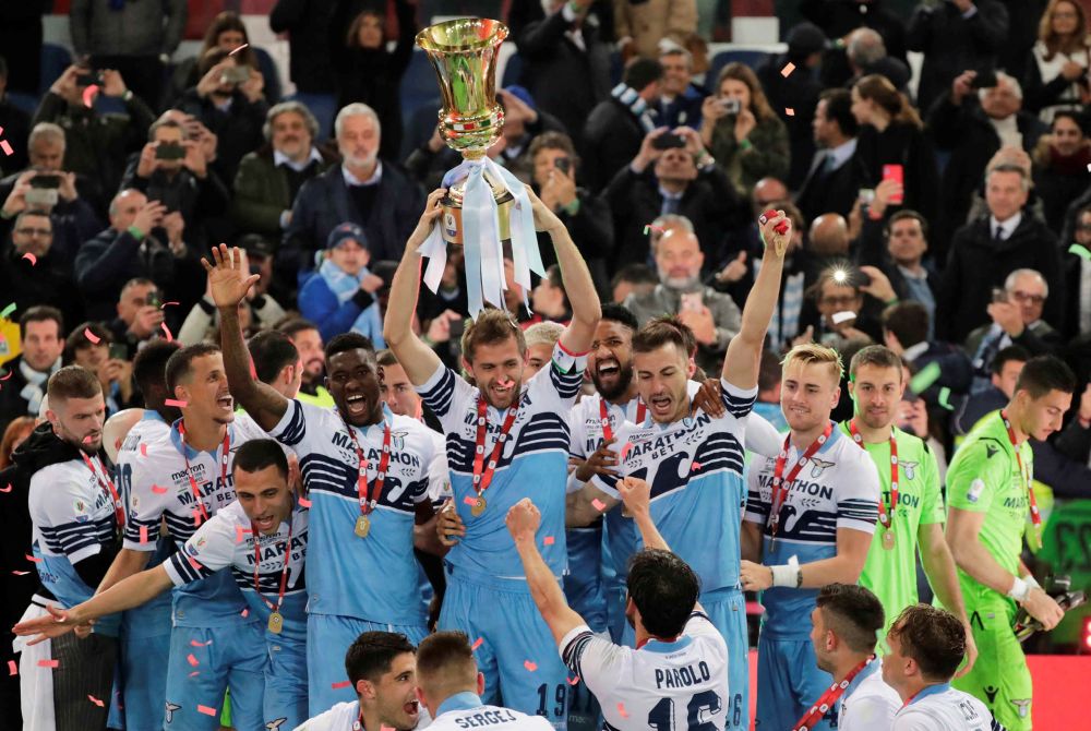 Lazio players celebrate with the trophy after winning the Coppa Italia. u00e2u20acu201d Reuters pic