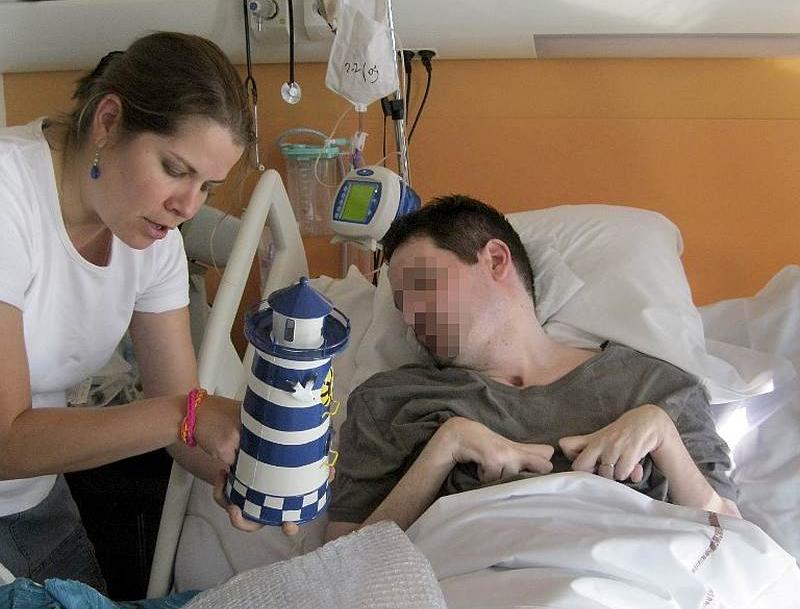 A handout photo from his parents shows quadriplegic Vincent Lambert on artificial life support with his sister Marie Lambert at a hospital in Reims September 28, 2014. u00e2u20acu201d AFP pic