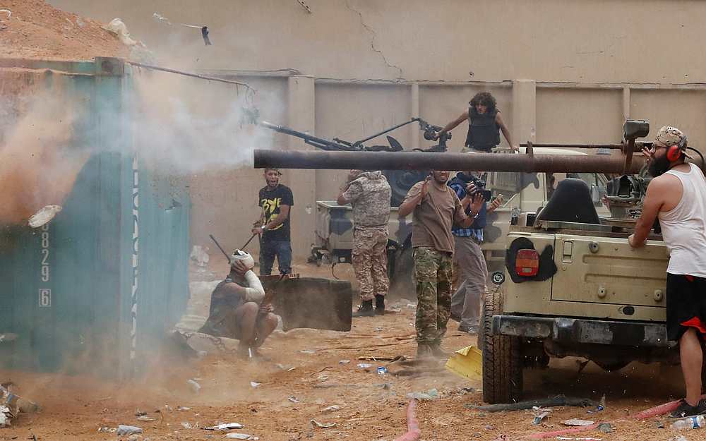 A fighter loyal to Libya's UN-backed government (GNA) fires a 105 mm recoilless rifle during clashes with forces loyal to Khalifa Haftar on the outskirts of Tripoli May 25, 2019. u00e2u20acu201d Reuters pic