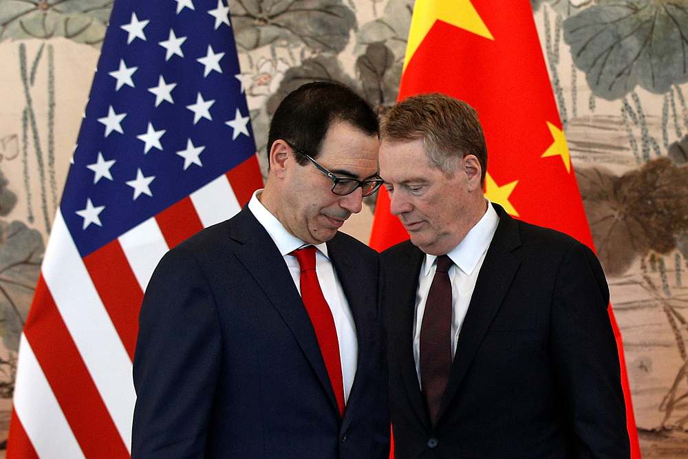 US Treasury Secretary Steven Mnuchin (left) and his Trade Representative Robert Lighthizer arrive for a group photo session at the Diaoyutai State Guesthouse in Beijing May 1, 2019. u00e2u20acu201d Andy Wong/Pool pic via Reuters