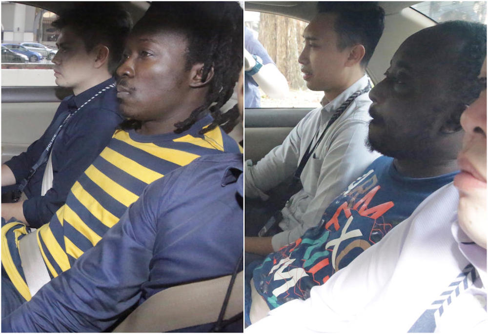 (From left) Nigerians Awolola Oladayo Opeyemi, 34, and Awolola Gbolahan Ayobami, 37, have been remanded in Singapore for further investigation into their involvement in a series of internet love scams. u00e2u20acu201d TODAY pic