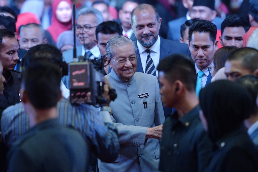Prime Minister Tun Dr Mahathir Mohamad arrives to deliver his keynote address, on the first anniversary of Pakatan Harapan as the government, in Putrajaya May 9, 2019. u00e2u20acu201d Picture by Shafwan Zaidon