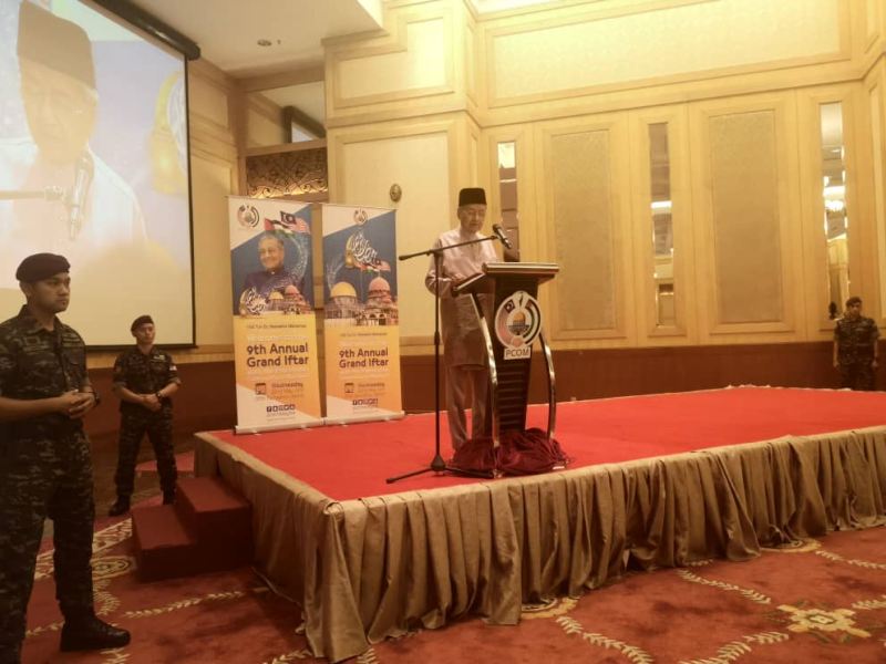 Tun Dr Mahathir Mohamad speaks during an Iftar event organised by PCOM at Puspanitapuri in Putrajaya May 22, 2019. u00e2u20acu2022 Picture via Twitter/bernamadotcom