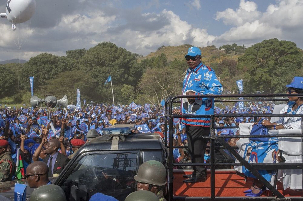 Malawian President Peter Mutharika (centre) and his wife Malawiu00e2u20acu2122s First lady Getrude Mutharika arrive for a final election campaign rally at Mjamba Park in the commercial city of Blantyre on May 18, 2019, ahead of general elections. u00e2u20acu201d AFP pic