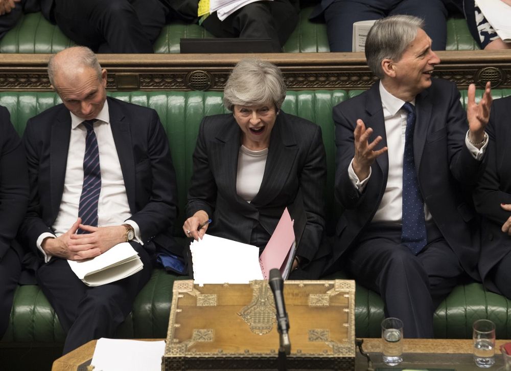 A handout photograph taken and released by the UK Parliament on May 22, 2019 shows Britainu00e2u20acu2122s Prime Minister Theresa May during the weekly Prime Minister's Questions (PMQs) session in the House of Commons. u00e2u20acu201d AFP pic