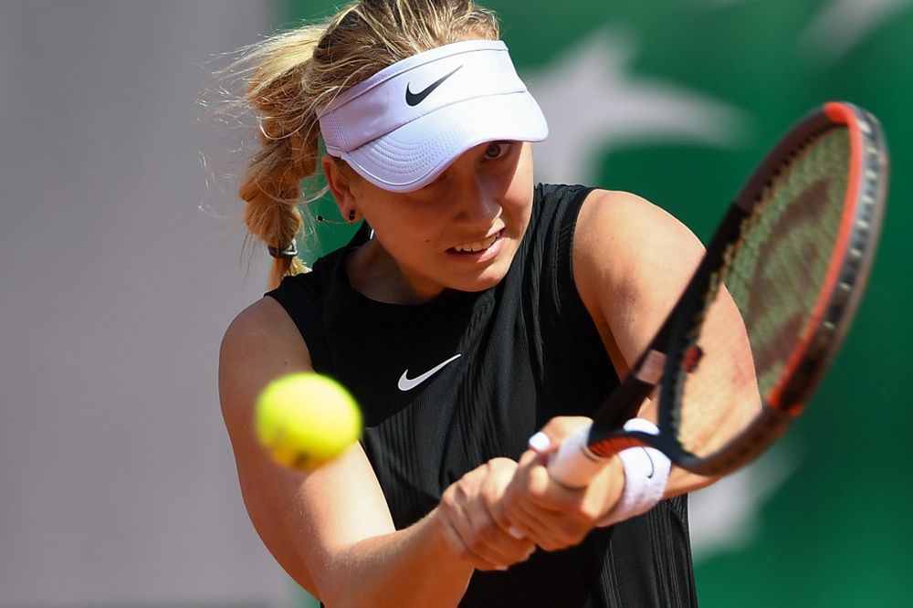 Anastasia Potapova returns the ball to Angelique Kerber during their womenu00e2u20acu2122s singles first round match on day 1 of The Roland Garros 2019 French Open tournament in Paris, May 26, 2019. u00e2u20acu201d AFP pic