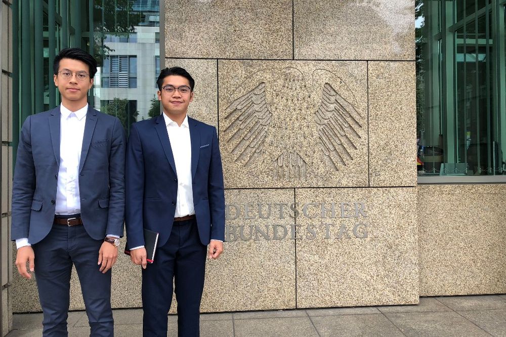 This handout courtesy of Ray Wong taken in June 2018 and released on May 22, 2019 shows activists Ray Wong (left) and Alan Li posing for a photo in Berlin. u00e2u20acu201dHandout pic courtesy of Ray Wong via AFP
