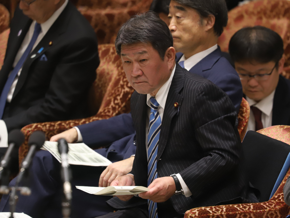 Japanese Economic Revitalisation Minister Toshimitsu Motegi listens to a question by an opposition lawmaker at Lower House's budget committee session at the National Diet in Tokyo February 18, 2019. u00e2u20acu201d Picture by Yoshio Tsunoda/AFLO via Reuters