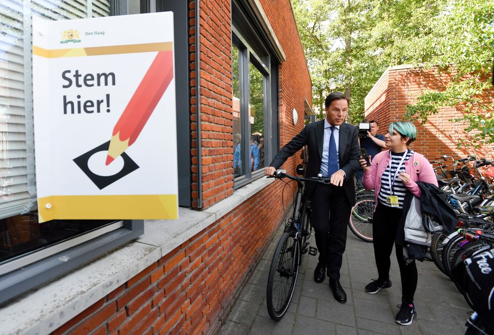 Dutch Prime Minister Mark Rutte of the Peopleu00e2u20acu2122s Party for Freedom and Democracy leaves a polling station with his bike after voting for the European elections, in The Hague, Netherlands, May 23, 2019. u00e2u20acu201d Reuters pic