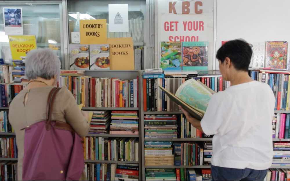 Customers browse books at a bookstore in Bras Basah Complex. — TODAY pic