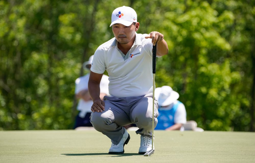 Kang Sung lines up a putt on the fourth hole during the final round of the AT&T Byron Nelson golf tournament at Trinity Forest Golf Club. u00e2u20acu201d Reuters pic