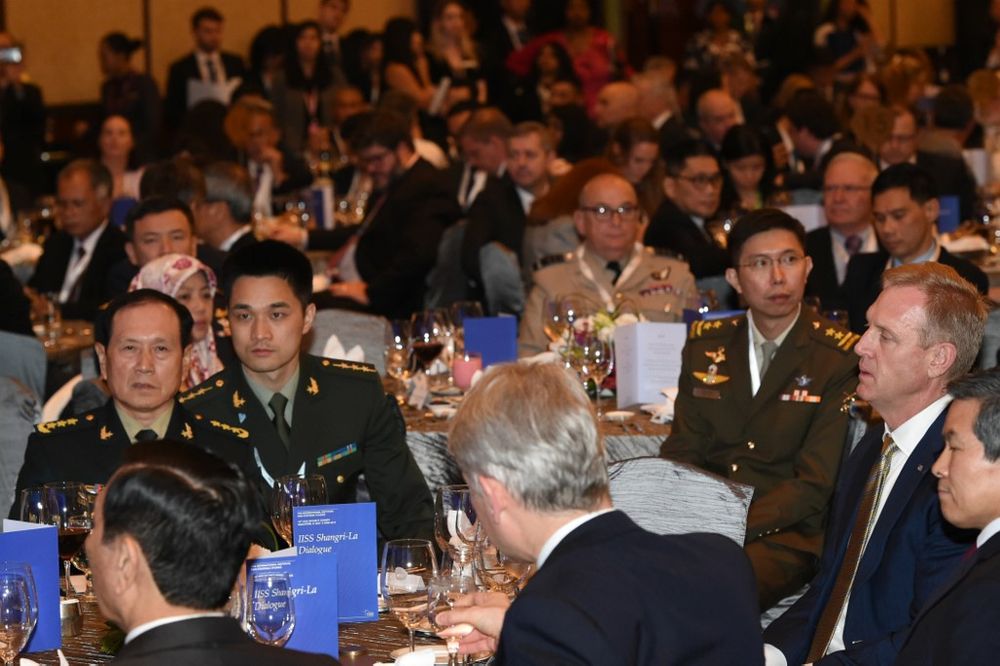 Chinau00e2u20acu2122s Defence Minister Wei Fenghe (left) and acting US Secretary of Defense Patrick Shanahan (front second right) attend the opening of the IISS Shangri-La Dialogue summit in Singapore on May 31, 2019. u00e2u20acu201dAFP pic
