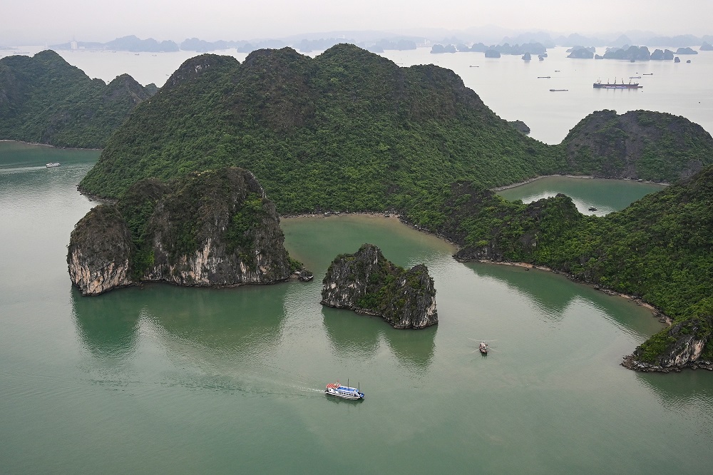 This aerial photo taken from a helicopter shows a tourist boat sailing on the waters of Ha Long Bay in northeastern province of Quang Ninh May 10, 2019. u00e2u20acu201d AFP pic      