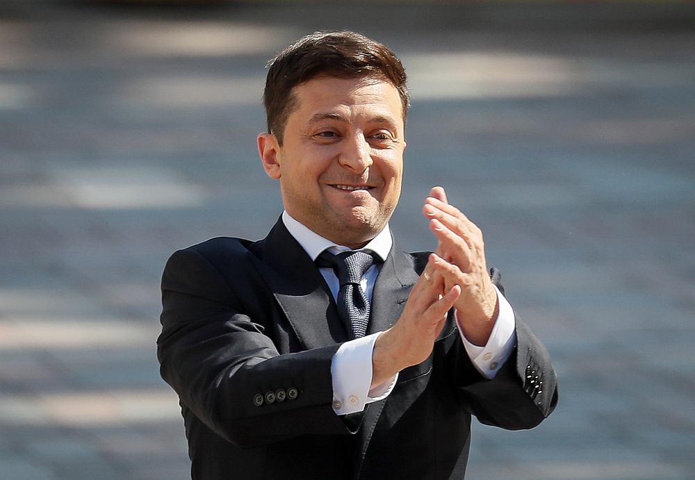 Ukraine's President-elect Volodymyr Zelenskiy applauds as he walks to take the oath of office ahead of his inauguration ceremony in the parliament hall in Kiev May 20, 2019. u00e2u20acu201d Reuters pic