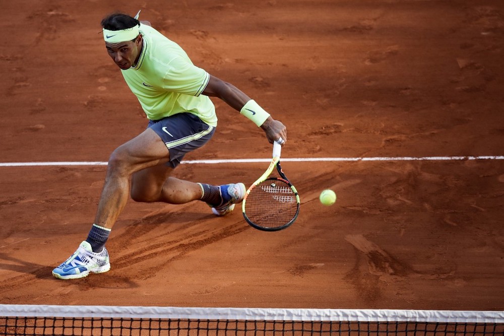 Spain’s Rafael Nadal returns the ball to Belgium’s David Goffin during their men’s singles fourth-round match against Greece’s Stefanos Tsitsipas at the 2019 French Open in Paris June 2, 2019. — AFP pic