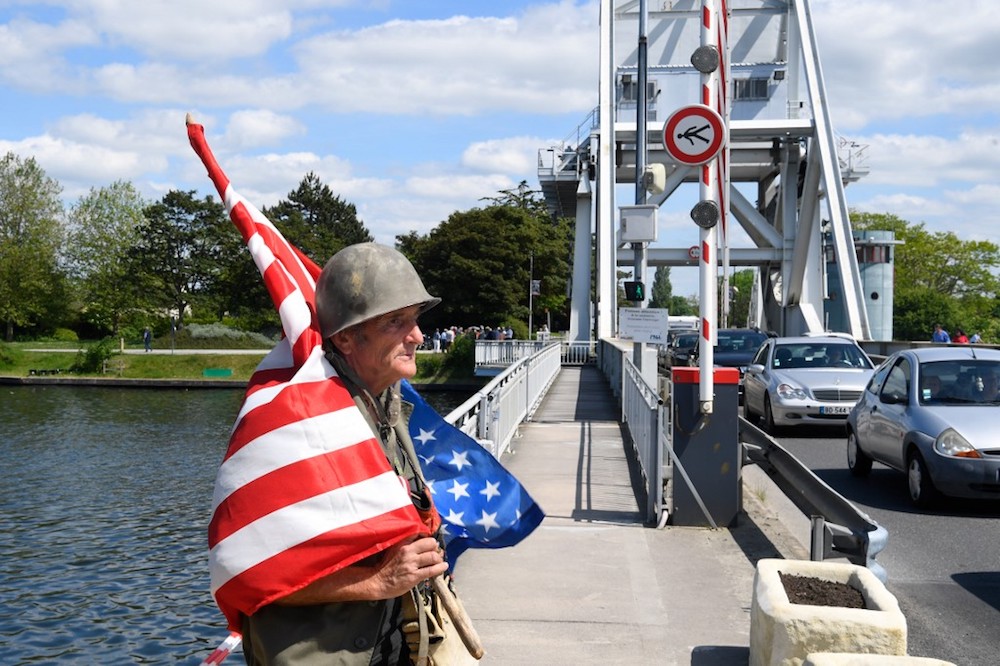 A man dressed as a US soldier stands next to the Pegasus Bridge in Benouville, northwestern France May 31, 2019. u00e2u20acu201d AFP pic