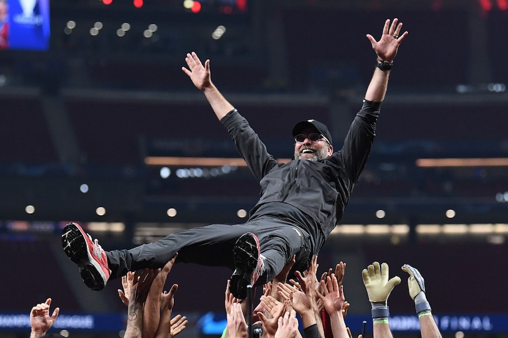 Liverpoolu00e2u20acu2122s Jurgen Klopp is thrown into the air by players after winning the Uefa Champions League final with Tottenham Hotspur at the Wanda Metropolitano Stadium in Madrid June 1, 2019. u00e2u20acu201d AFP pic