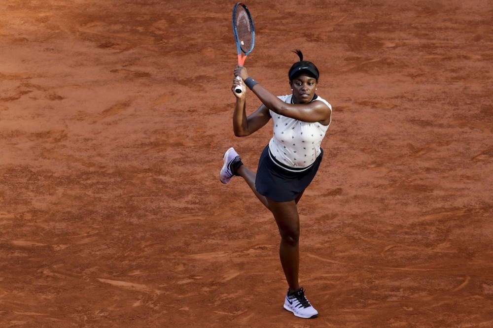 Sloane Stephens of the US returns the ball to Spain’s Garbine Muguruza during their women’s singles fourth-round match at the 2019 French Open in Paris June 2, 2019. — AFP pic