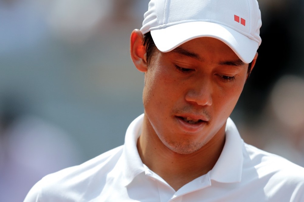 Japanu00e2u20acu2122s Kei Nishikori reacts during his menu00e2u20acu2122s singles quarter-final match against Spainu00e2u20acu2122s Rafael Nadal at the 2019 French Open in Paris June 4, 2019. u00e2u20acu201d AFP pic