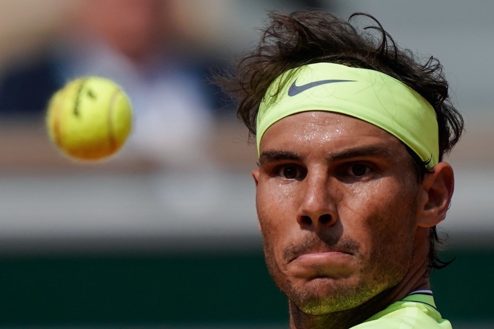 Spainu00e2u20acu2122s Rafael Nadal eyes the ball as he returns the ball to Japanu00e2u20acu2122s Kei Nishikori during their menu00e2u20acu2122s singles quarter-final match at the 2019 French Open in Paris June 4, 2019. u00e2u20acu201d AFP pic