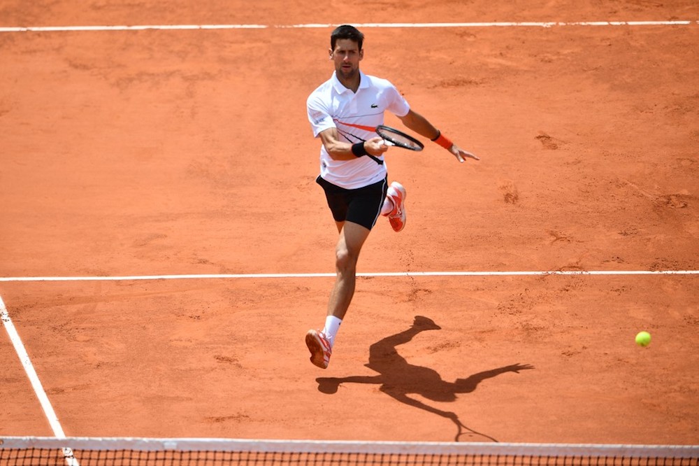 Serbiau00e2u20acu2122s Novak Djokovic returns the ball to Austriau00e2u20acu2122s Dominic Thiem during their menu00e2u20acu2122s singles semi-final match at the 2019 French Open in Paris June 8, 2019. u00e2u20acu201d AFP pic