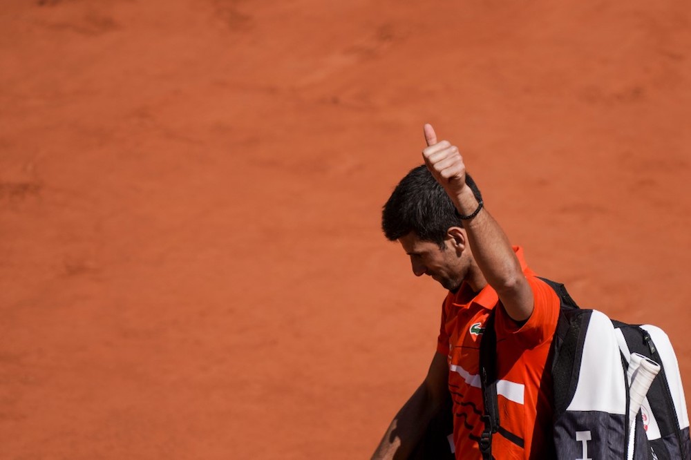 Serbiau00e2u20acu2122s Novak Djokovic leaves the court and acknowledges the audience after losing against Austriau00e2u20acu2122s Dominic Thiem at the end of the menu00e2u20acu2122s singles semi-final match at the 2019 French Open in Paris June 8, 2019. u00e2u20acu201d AFP pic