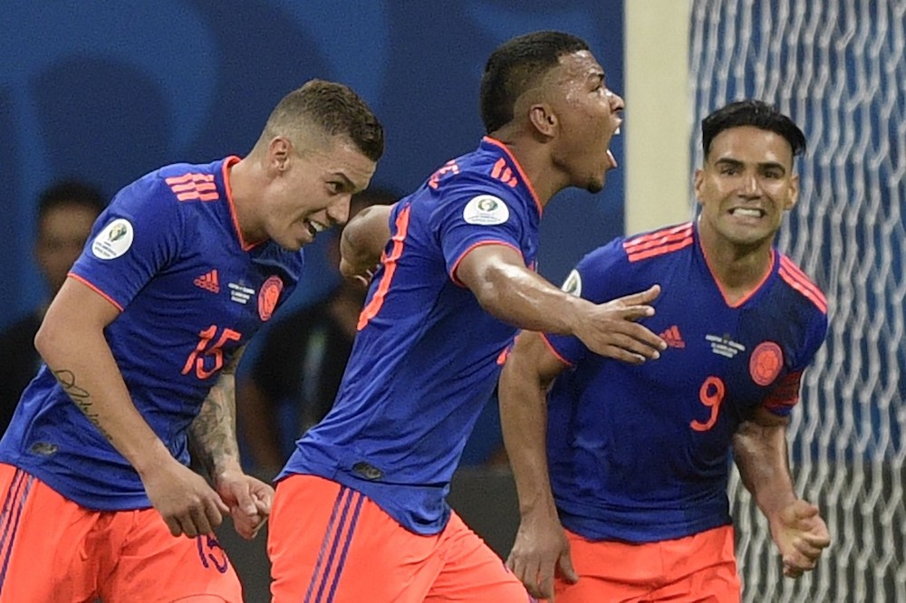 Colombiau00e2u20acu2122s Roger Martinez celebrates with teammates Mateus Uribe and Radamel Falcao after scoring against Argentina during their Copa America group match in Salvador, Brazil June 15, 2019. u00e2u20acu201d AFP pic