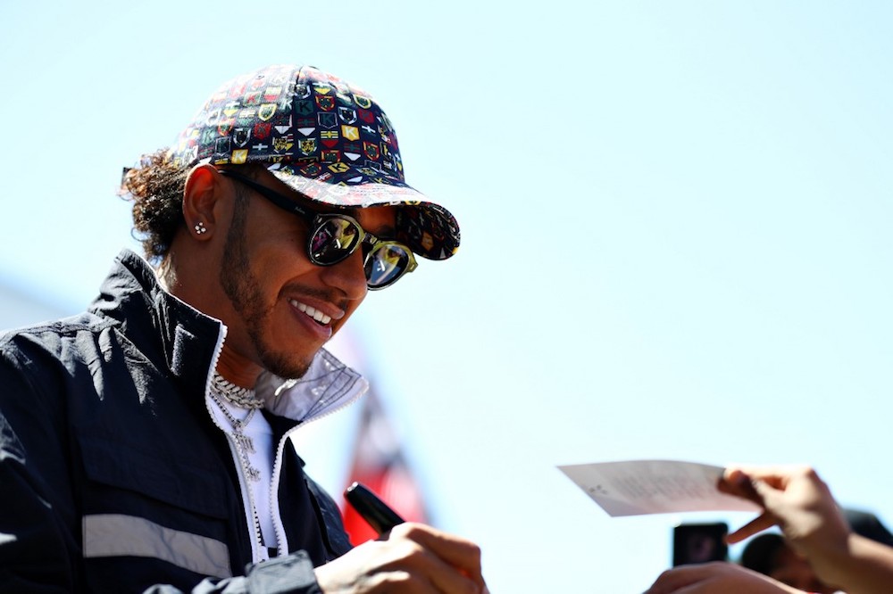 Lewis Hamilton of Mercedes GP signs autographs for fans during previews ahead of the 2019 Canadian Grand Prix at Circuit Gilles Villeneuve in Montreal on June 6, 2019. u00e2u20acu201d AFP pic
