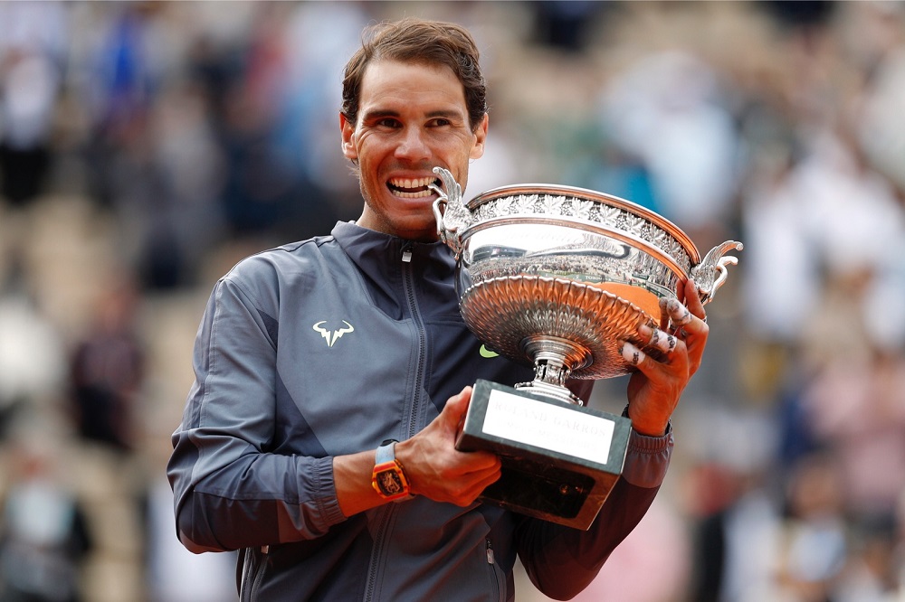 Rafael Nadal celebrates with the trophy after his final match against Dominic Thiem at the French Open in Roland Garros June 9, 2019. u00e2u20acu201d Reuters pic